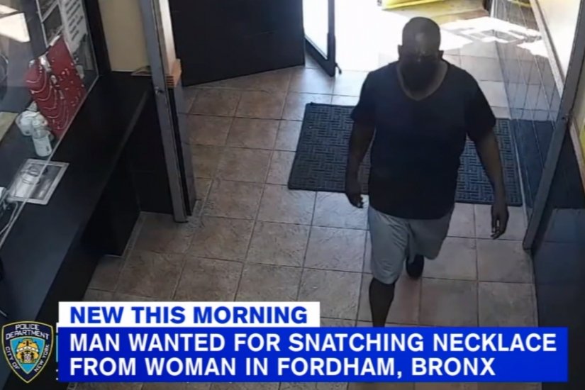 Man snatches woman's necklace off her neck in Fordham pawnshop